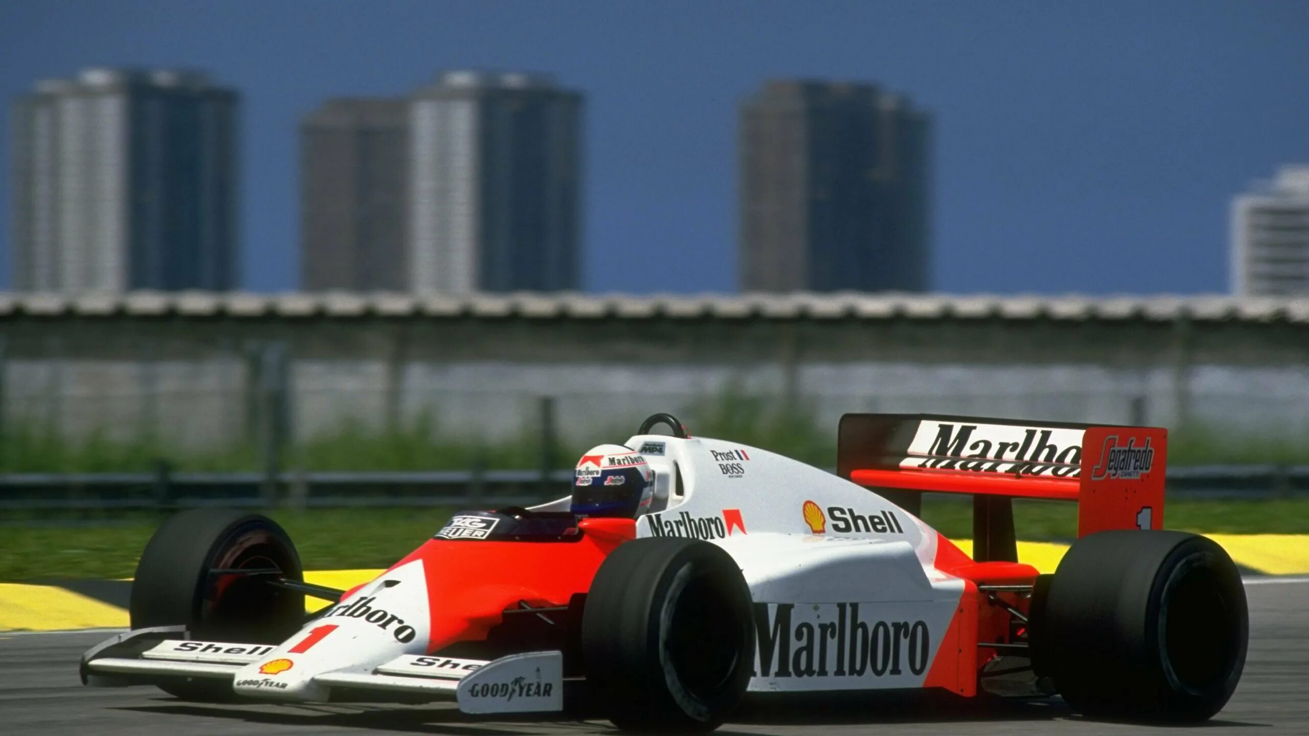 Прост формула 1. F1 1986 MCLAREN. MCLAREN mp4/4 Prost. MCLAREN mp4/2 tag-Porsche. MCLAREN mp4/2.