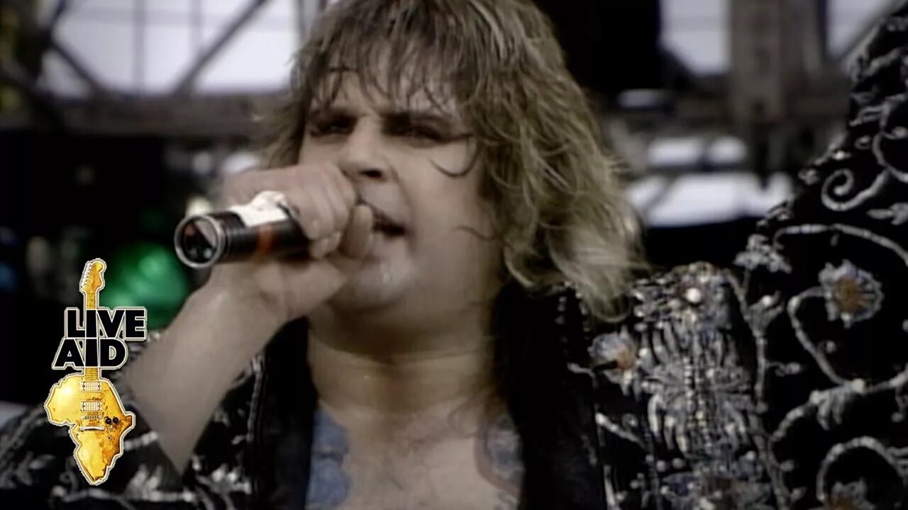 Ozzy osbourne paranoid. Ozzy osbourne 1985. live aid оззи. ozzy osbourne live aid 1985. оззи осборн live.