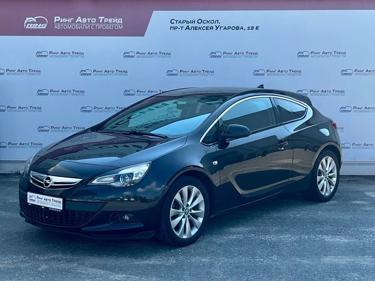 Автомобили с пробегом оскол. Opel Astra GTC 2013 год. Opel Astra narxi.