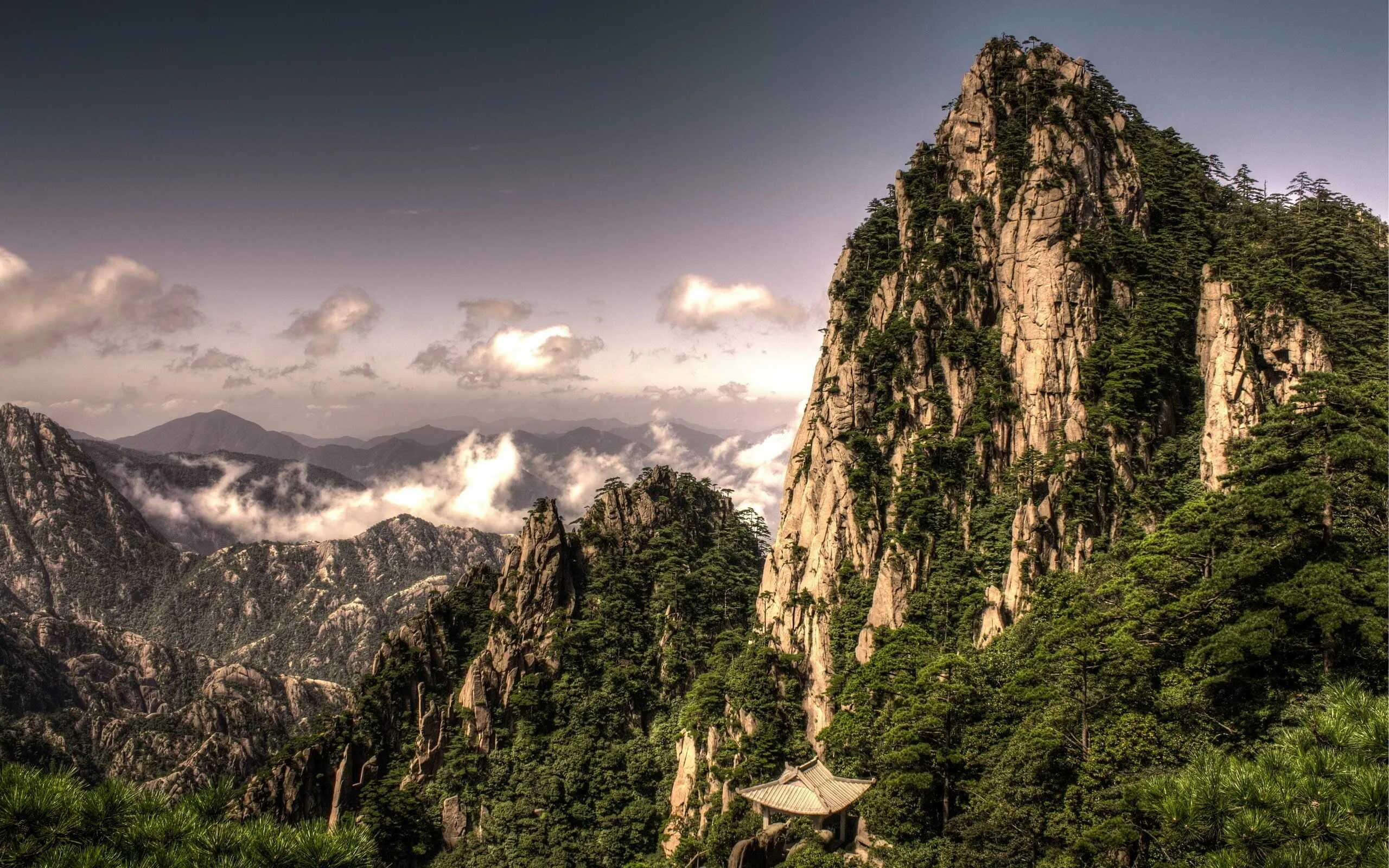 Higher mountains. Горы Хуаншань, Китай. Горы Чжанцзяцзе. Горы покрытые лесами. Лес горы скалы.