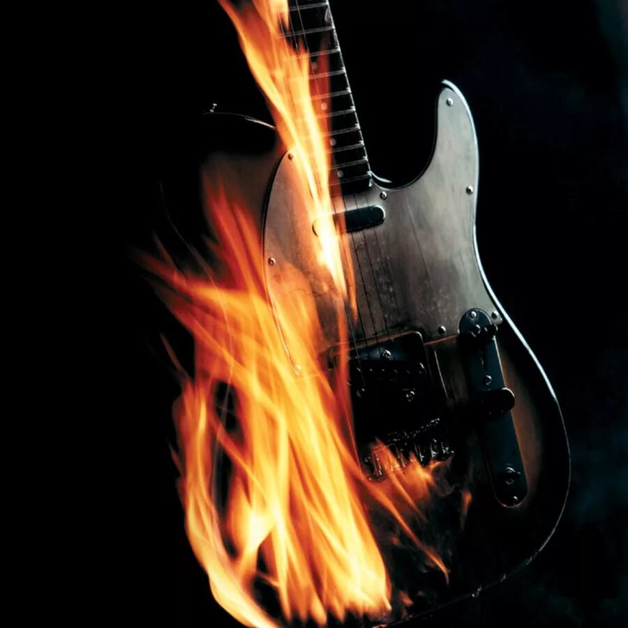 Гитара сгорела. Огненная гитара. Гитара в огне. Электрогитара в огне. Рок.