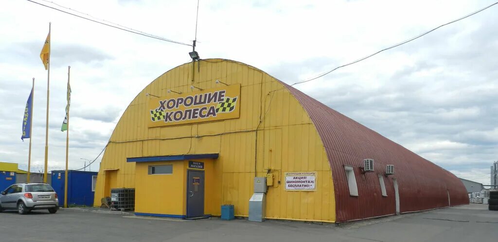 Октябрьская набережная 104 к 25. Спб колесо октябрьская набережная. Колесо октябрьская набережная. 104. Автосервис на октябрьской набережной 104.