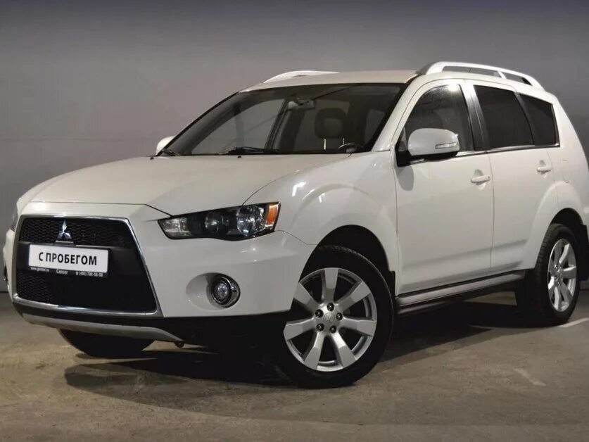 Mitsubishi белая. Митсубиси Аутлендер 2010 белый. Mitsubishi Outlander XL 2014. Белый Mitsubishi Outlander 2010. Outlander 2,2 2010 белый.