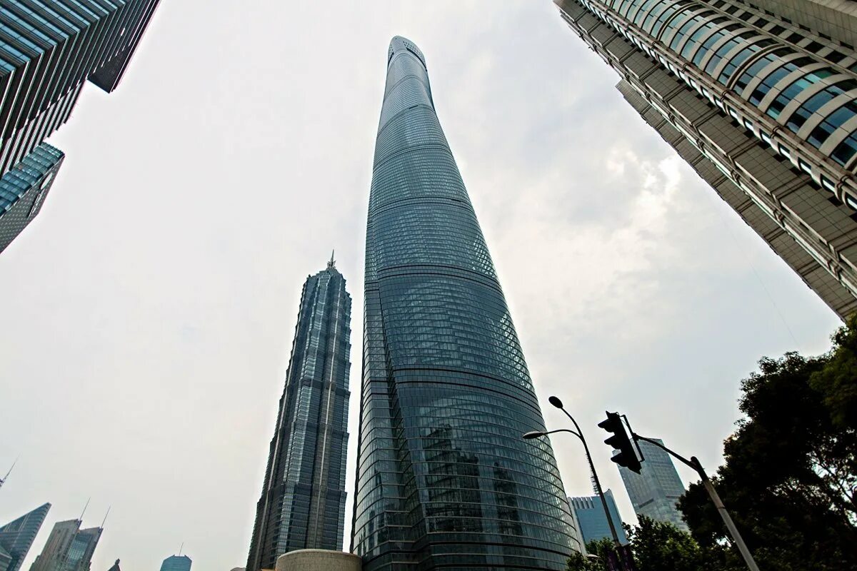 Самое огромное здание. Шанхай ТОВЕР небоскреб. Шанхайская башня в Шанхае. Небоскрёб Шанхай Тауэр.. Шанхай Тауэр высота.