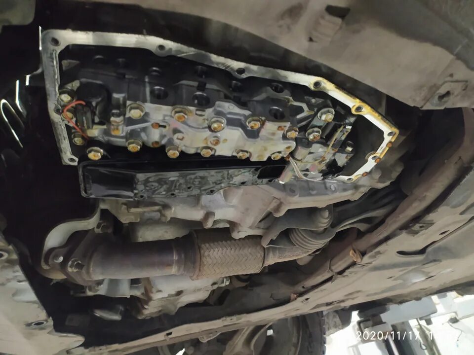 Цивик замена масла акпп. Honda Civic 4d 4wd дно. Фильтр вариатора Хонда Цивик 9 поколения. Маслоприемник Civic 4d. Масляный фильтр Хонда Цивик 4д где находится.