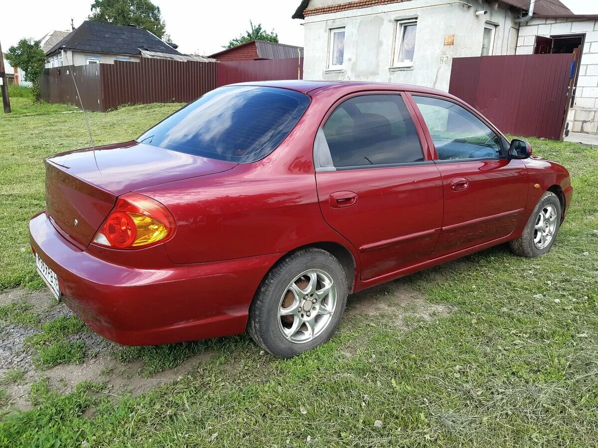 Купить киа спектра в москве. Kia Spectra красная. Киа спектра Вишневая. Киа спектра 2006 красный перец. Киа спектра 2008 красный перец.