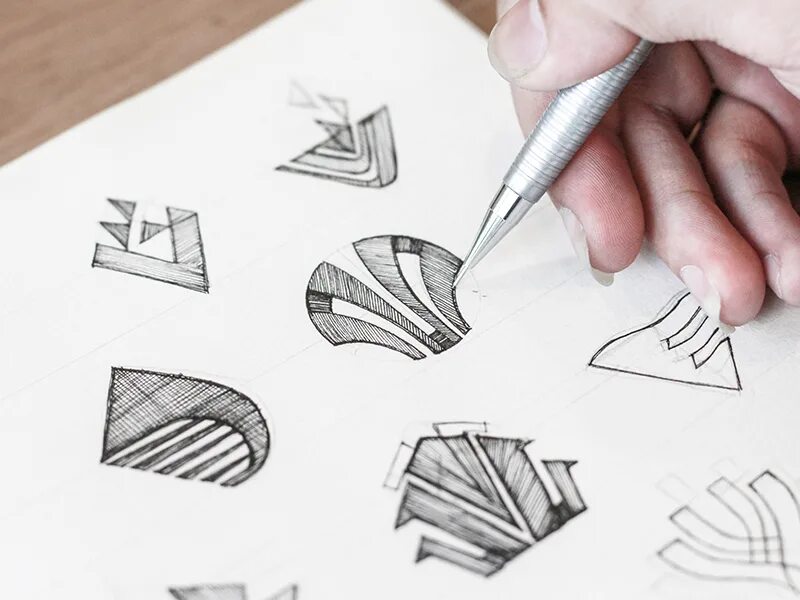 Разработка идей эскиз 8 класс. Разработка логотипа эскизы. набросок логотипа. разработка логотипа по эскизу. эскизирование логотипа.