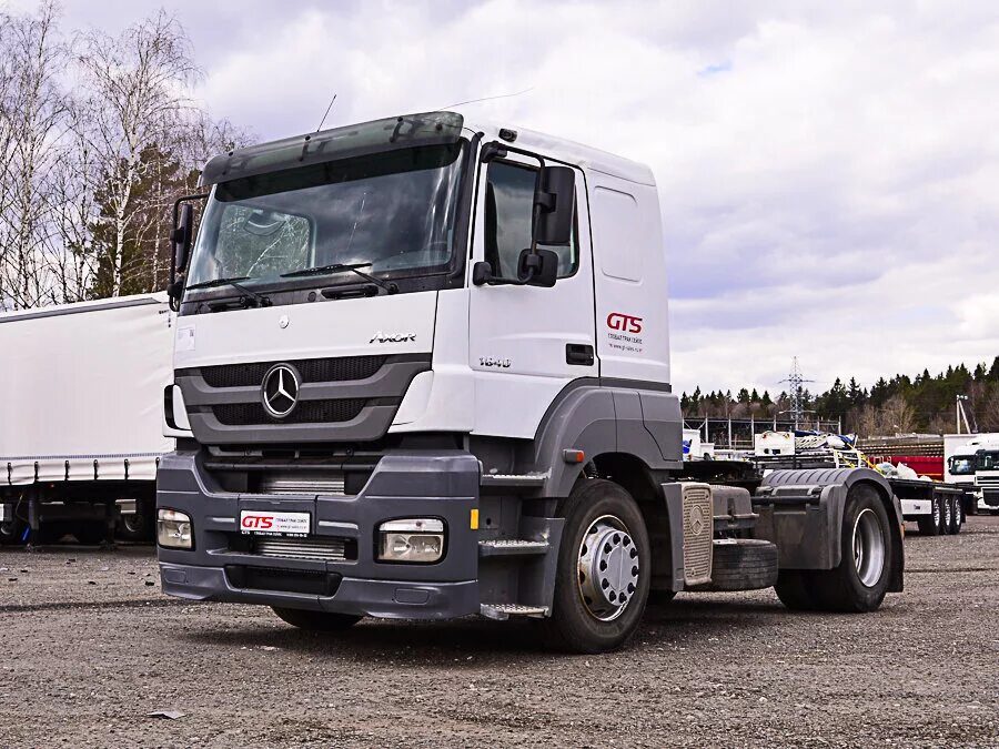 Седельные тягачи mercedes benz. Тягач седельный Мерседес Axor. Mercedes Axor 1840 тягач седельный. Мерседес Бенц Аксор 1840 2011. Mercedes Benz Axor 2011.