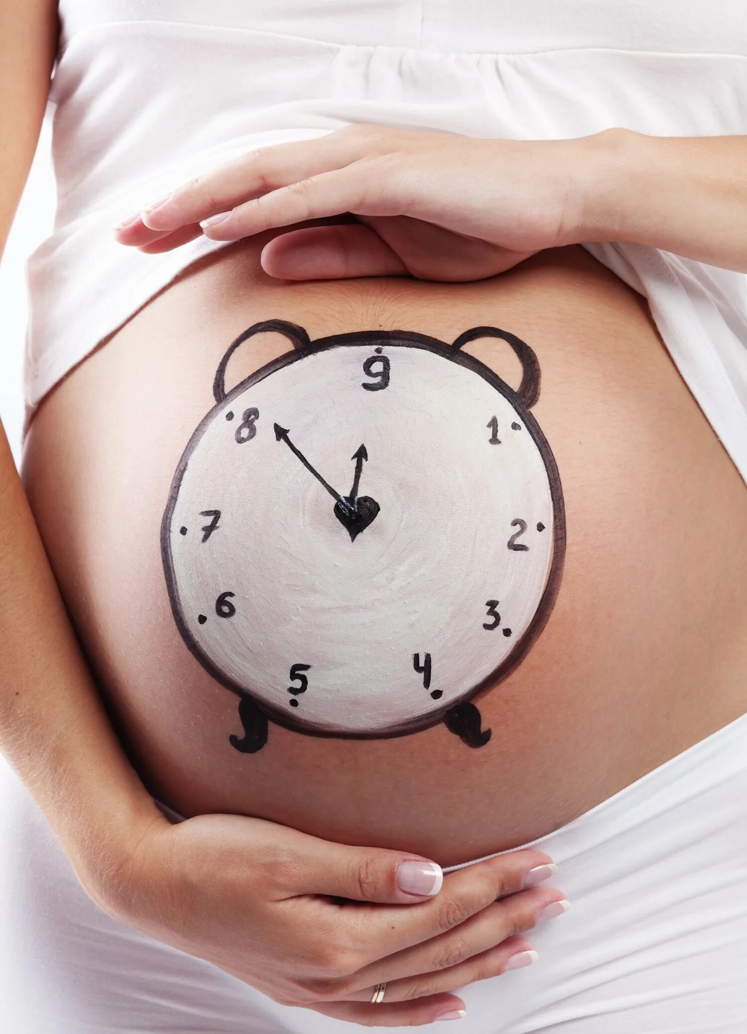 Живот беременной и часы. Часы на животе. Беременные животики.