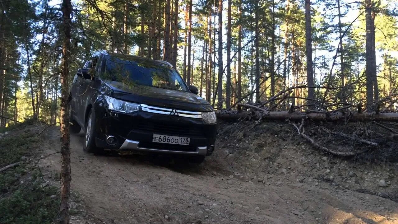 Видео полный привод тест драйв. Mitsubishi Outlander полный привод. Полный привод Аутлендер 3. Outlander 3 полный привод. Аутлендер 3 в горах.