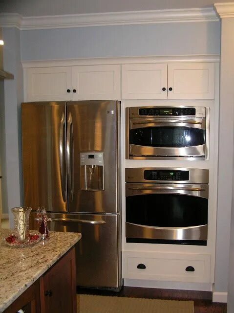 Next to the fridge