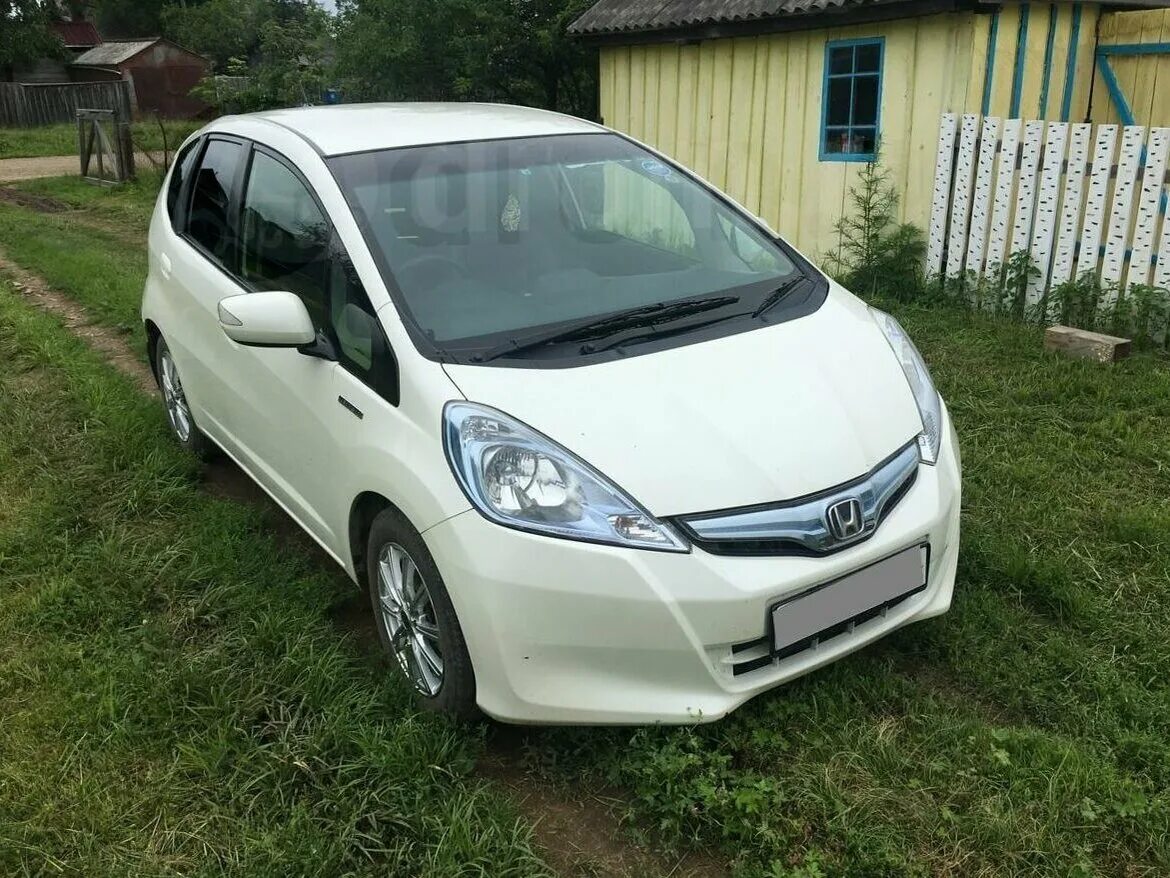 Honda fit 2013. Honda Fit 2013 Hybrid. Хонда фит 2013 года. Хонда фит 2013 гибрид.