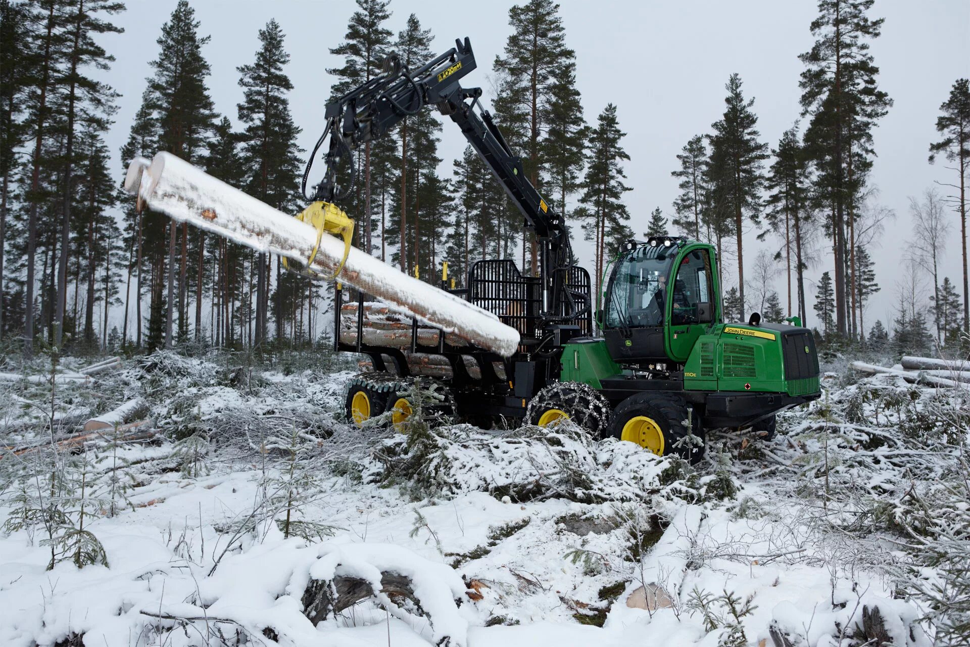 Харвестер John Deere. John Deere 1110e. Форвардер Джон Дир. John Deere Лесозаготовительная техника.