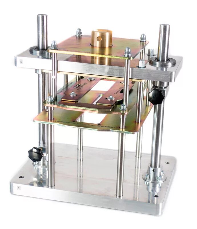 оснастка для испытания клеммных болтов. изделие в оснастке для виброиспытаний. оснастка для вибрационных испытаний. приспособление для испытания крестообразных сварных соединений. оснастка для испытаний.