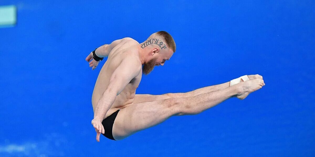 Прыжки в воду чемпионат россии. Прыгун в воду. Российские прыгуны с трамплина в воду.
