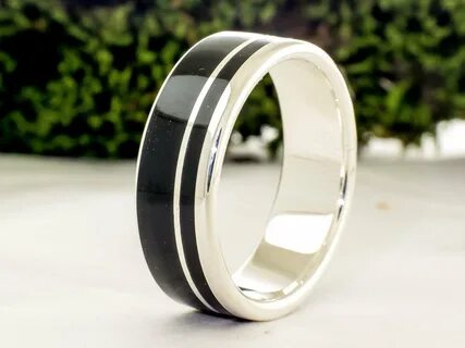 Ebony Wood Ring and sterling silver This ring is made from a sterling silve...