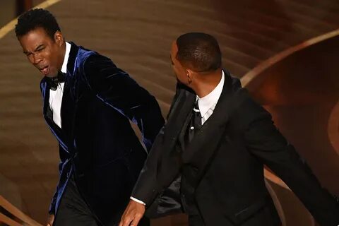 Will Smith walked onstage and slapped Chris Rock after he made a joke about...