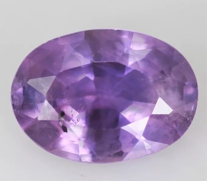 Какой камень фиолетовый. Сапфир сиреневый 0,84. Лавандовый сапфир. Рубин сапфир аметист. Фиолетовый сапфир камень.