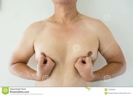 Photo about Close up men boob of fat man. 