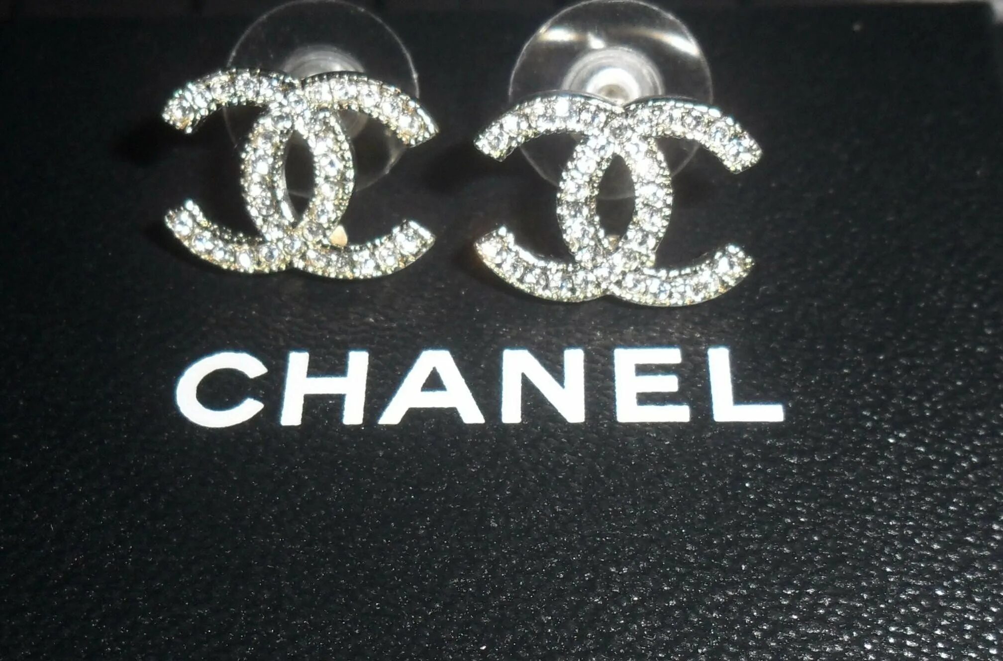 Chanel. Эмблема Шанель фото. Chanel обои. Coco Chanel логотип.