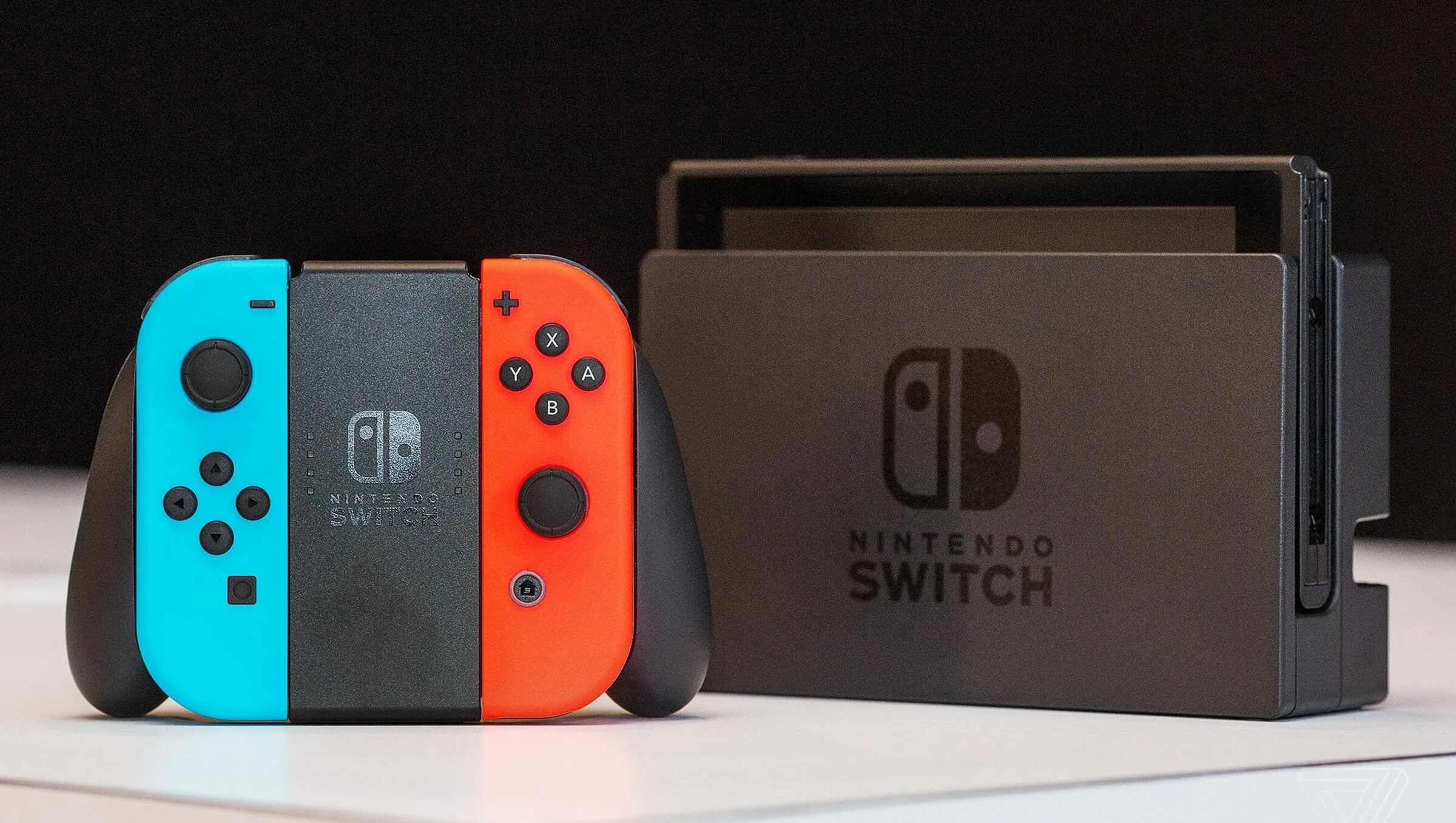Nintendo switch 2 pro. Большая nintendo switch. Nintendo switch коробка. Фон нинтендо свитч. Игровая консоль nintendo switch.