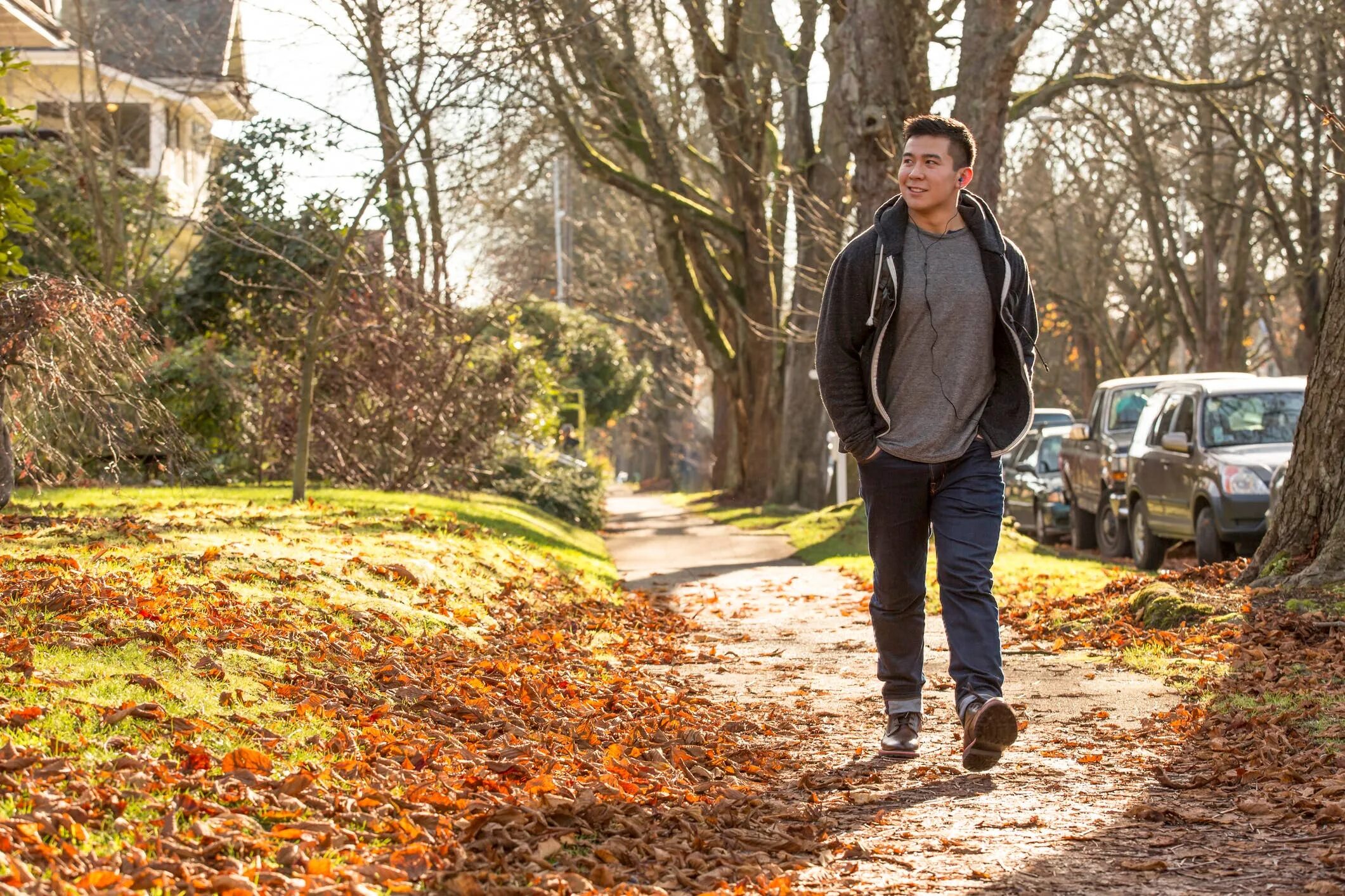 I like going for a walk. Walking man. walking outside. a man walking on the street. people walking outside in the park.