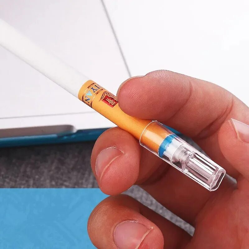 фильтры для самокруток. фильтр от сигареты. сигареты с оранжевым фильтром. ацетат для фильтров сигарет. много сигарет.