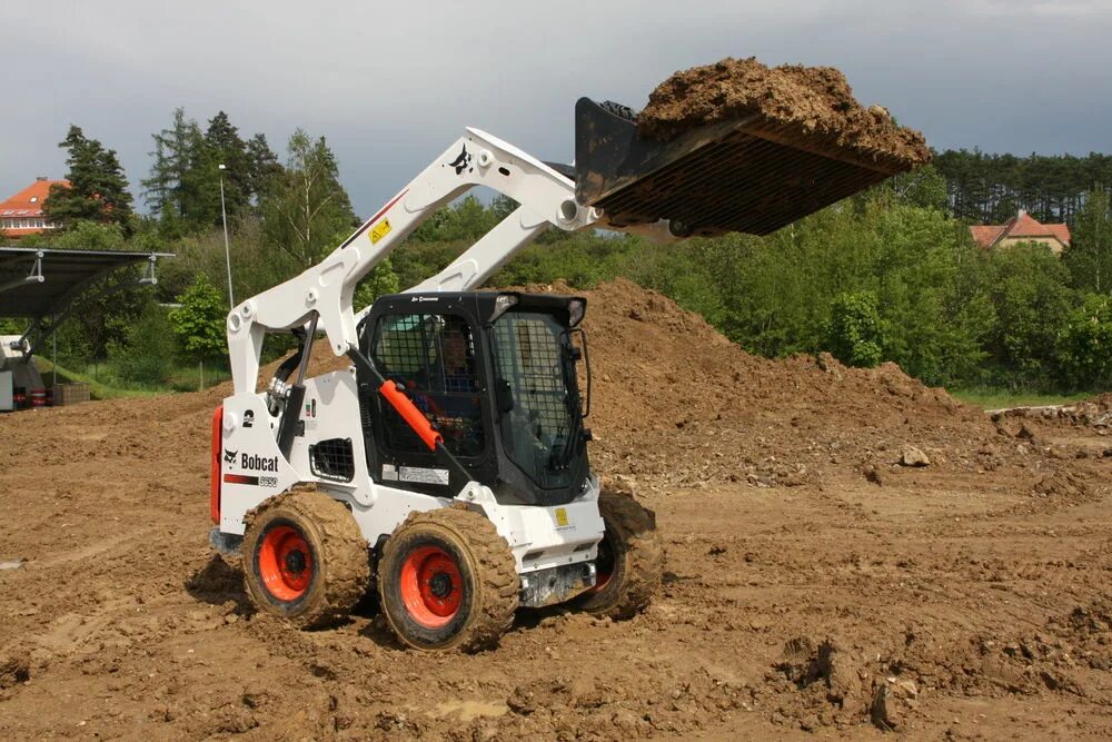 Bobcat s250. Погрузчик Bobcat s650. Мини погрузчик Bobcat s250. Мини погрузчик Бобкэт s650. Бобкэт 650.