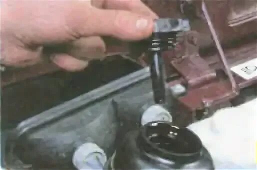 Масляный щуп нива шевроле. Заливная пробка раздатка нива 2121. Уровень масла в раздатке нива 2121. Как проверить уровень масла в ниве. Заливная горловина раздатки нива шевроле.