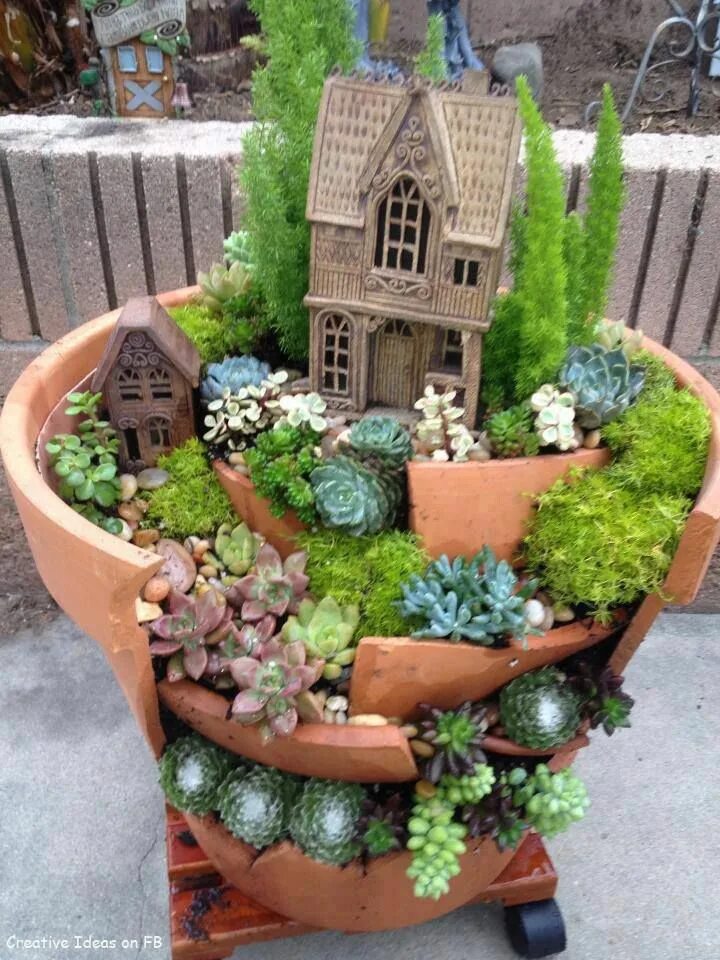 Multi-layer broken pot fairy garden! Best thing about breaking a pot for a fairy