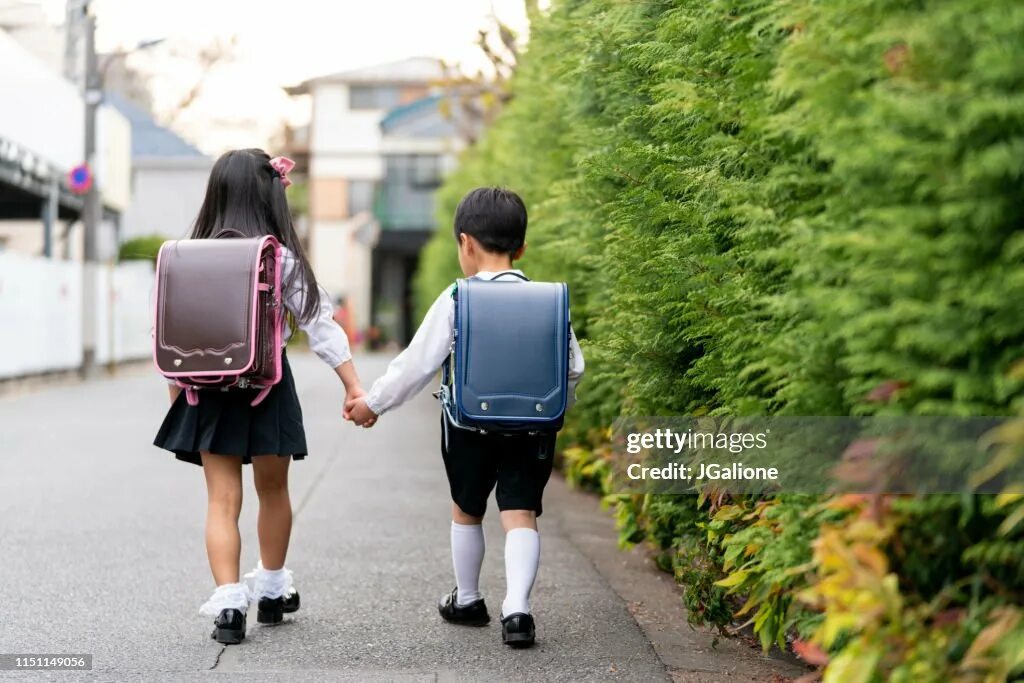 My brother goes to school on foot
