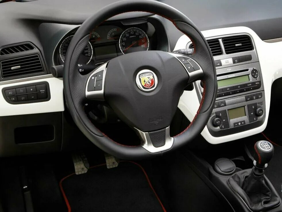 Салон гуди. Fiat grande punto салон. Фиат Пунто 2007 салон. Fiat punto 3 салон. Фиат Гранде Пунто Abarth.