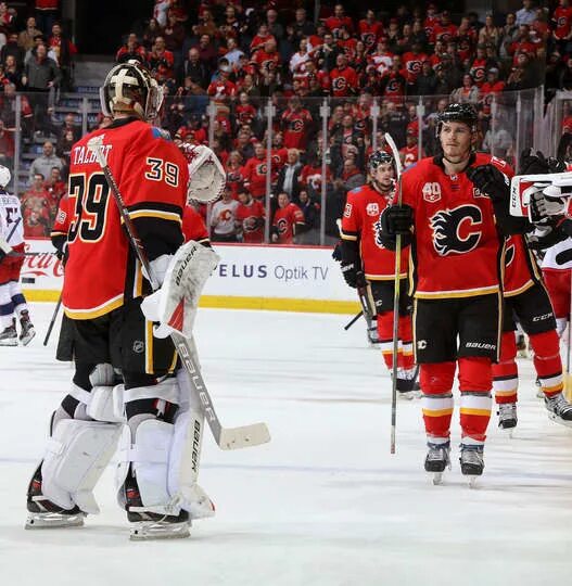 Калгари коламбус. Калгари коламбус. Коламбус калгари. Калгари хоккей. Коламбус блю джекетс арена.