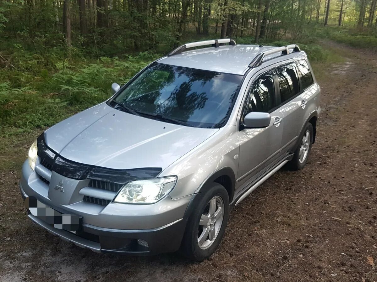 Мицубиси аутлендер полный привод. Mitsubishi Outlander 2004. Митсубиси Аутлендер 2004. Mitsubishi Outlander 2004 года. Митсубиши Аутлендер 2004.