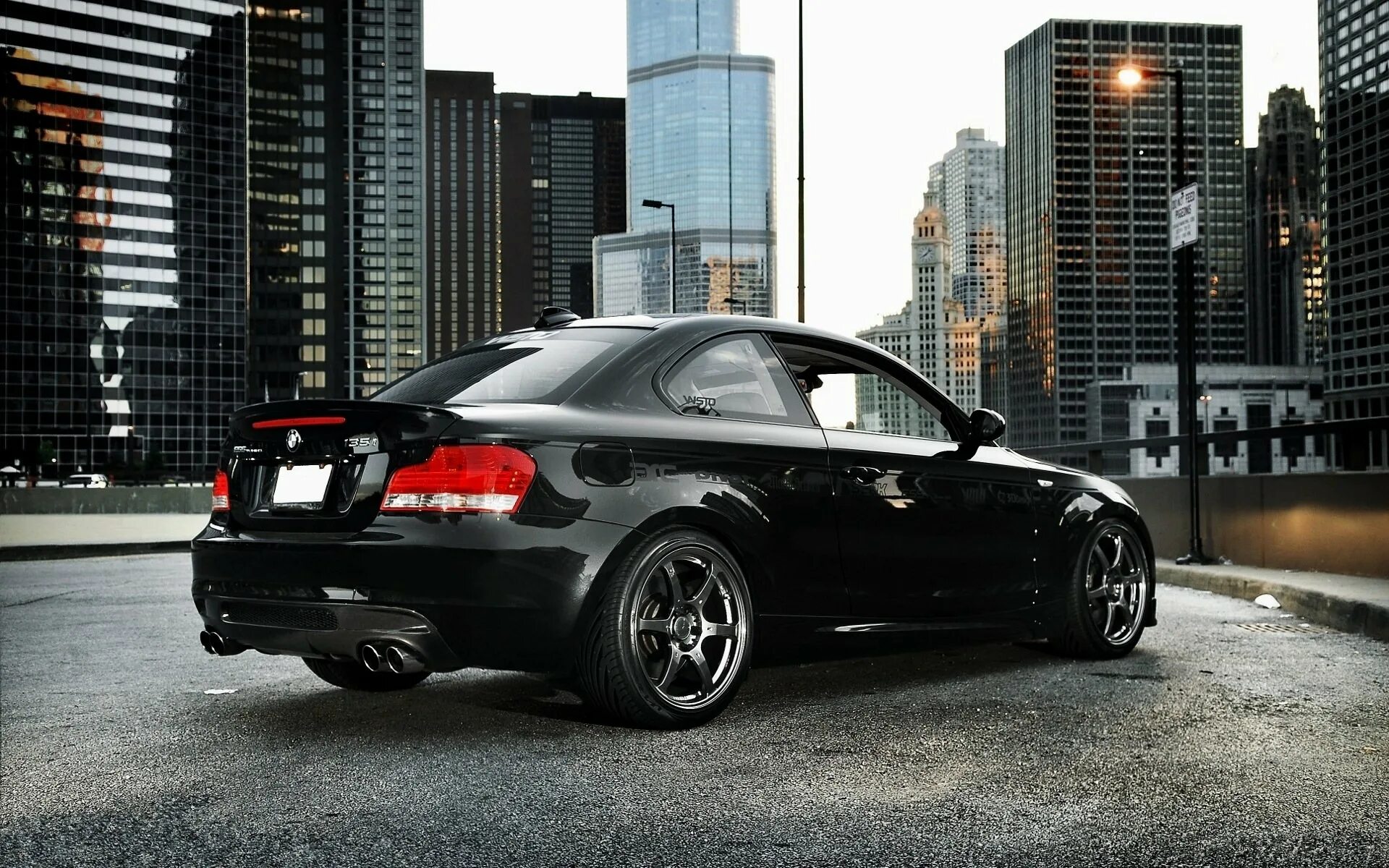 Черная 1 ру. BMW 135i Coupe Tuning. БМВ 135. BMW e82 Coupe Black. Е82 BMW 135.