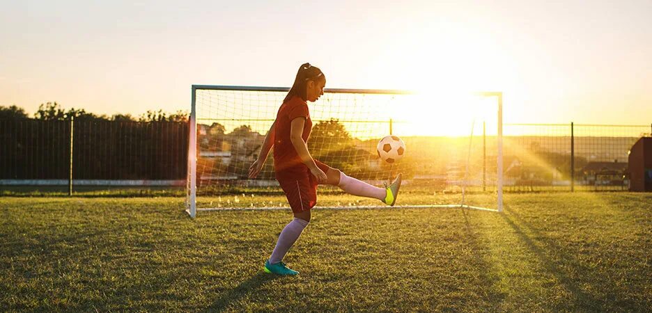 They playing football at the institute. Woman playing Football. The girl Plays Football at Break time for Kids. The girl Plays Football at Breaktime. Women not allowed to Play Football since.