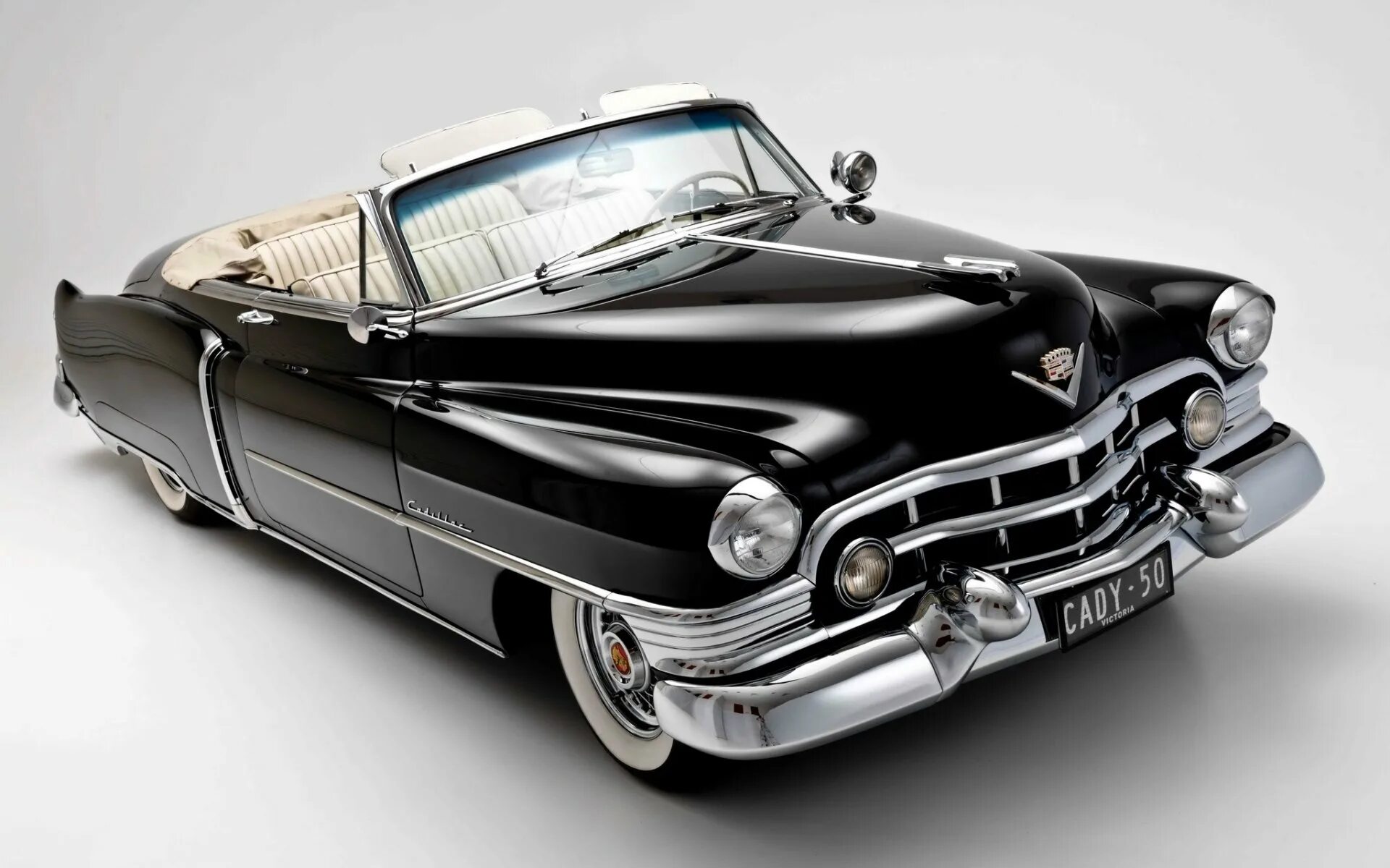 Старые машины черные. Cadillac 1950 Cabriolet. Cadillac Eldorado 1950. Cadillac Sixty-two Convertible 1950. Кадиллак 1920х.