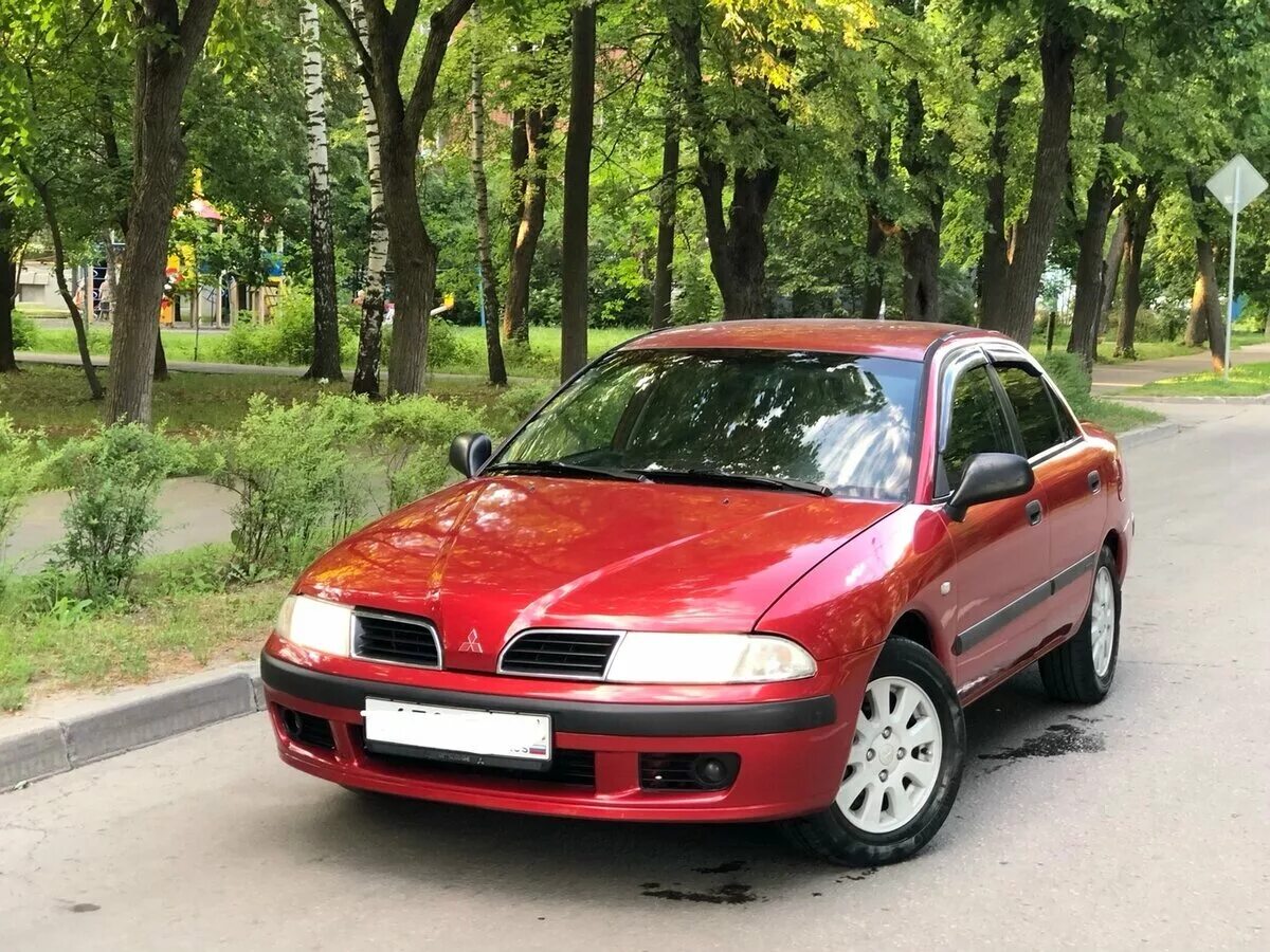 Mitsubishi lancer 2010. Машины до 200к. 200 200 иномарки. 200 200 иномарки. Мицубиси лансер x 2010.