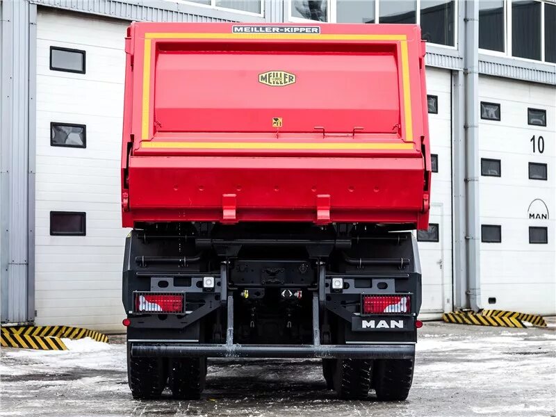 Ман тгс задний ход. Man tgs 41.480. ман tgs41 480. ман тгс 41 480 8х8 самосвал. ман тгс сзади.