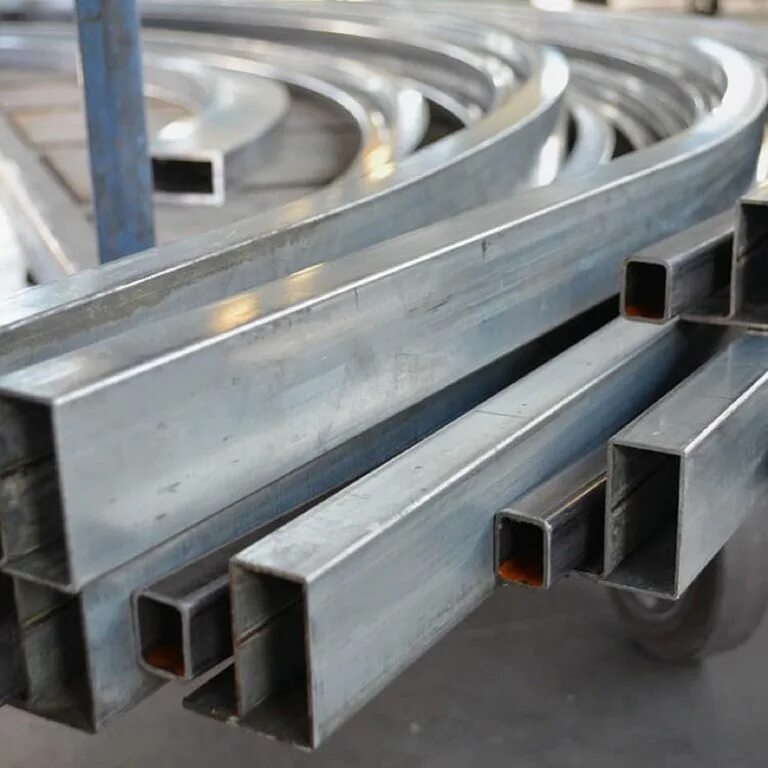 Гибка ручей 10мм нерж 1. Трубогибочный станок uni42a. Гнутая труба из нержавейки. Гибка нержавеющей трубки 10 мм. Гибка алиуииновои трубы круглого сечения 200х1 мм.