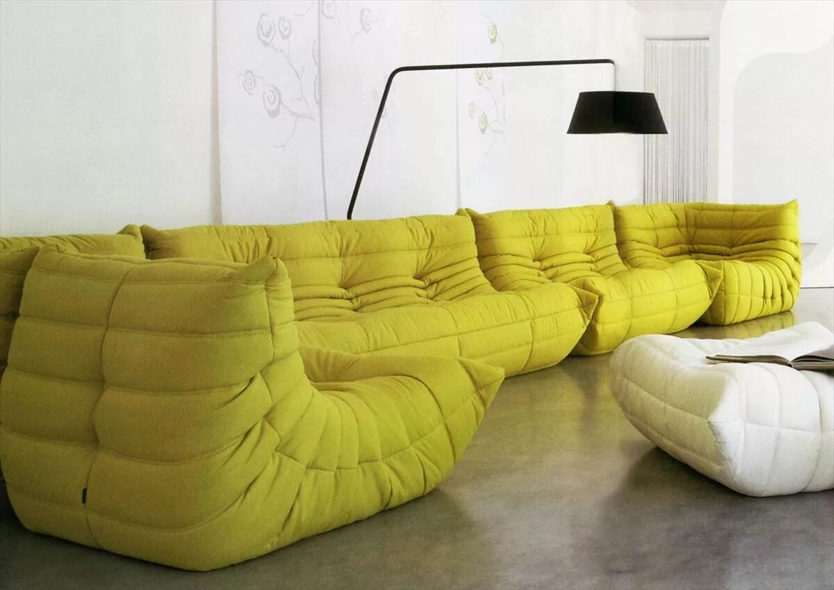 Modern low level sitting to make our guest feel at home. Purple living room furn