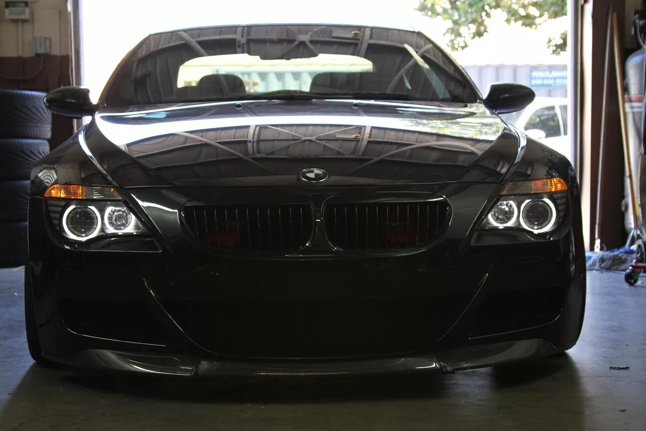 БМВ е63 черная. BMW e63 фары. Ангельские глазки BMW e63. BMW m6 e63 Black. Бмв е60 глазки