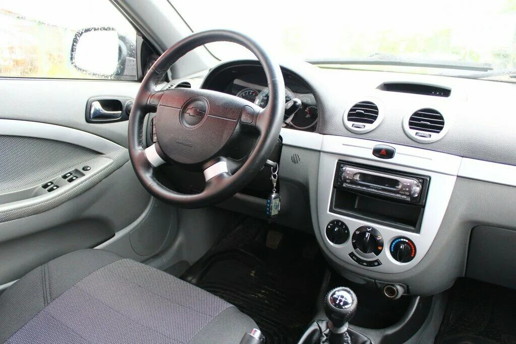 Chevrolet Lacetti 2012 хэтчбек салон. Chevrolet Lacetti 2008 хэтчбек салон. Chevrolet Lacetti хэтчбек салон. Шевроле Лачетти хэтчбек 2008 салон. Шевроле лачетти хэтчбек автомат