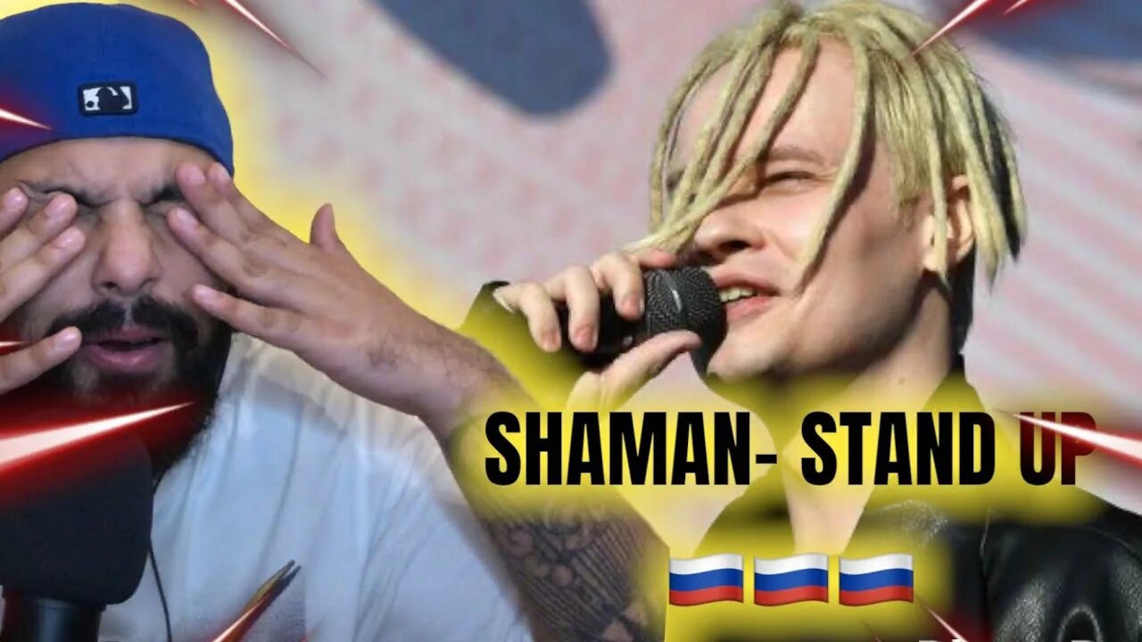 Шаман исполняет песню встанем. Shaman (певец). Шаман встанем. Шаман певец фото. Shaman певец на фоне флага.