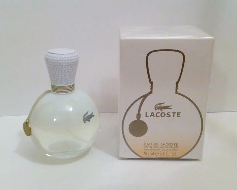 90 мл купить. Lacoste Eau de Lacoste (женские) 90ml парфюмерная вода. Lacoste Eau de Lacoste (Парфюм лакост) - 90 мл.. Духи лакоста круглый флакон белый. Лакоста духи женские круглые.