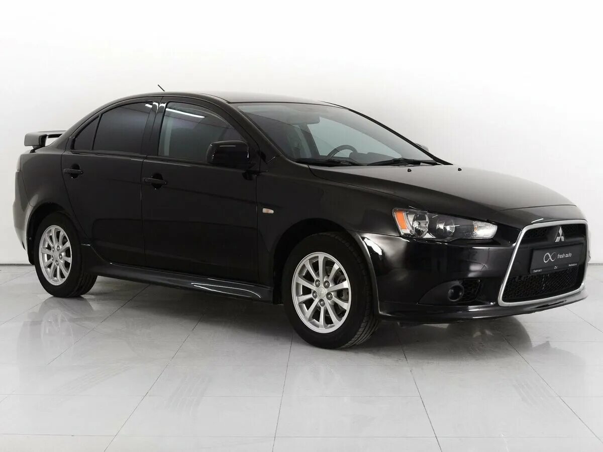 Митсубиси рестайлинг. Mitsubishi lancer 10 рестайлинг черный. mitsubishi lancer 10 restyling. mitsubishi lancer x рестайлинг 2012. черный мицубиси ланцер 10 рестайлинг.