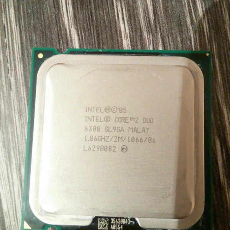 Интел 6300. Core 2 duo e6300. core 2 duo 6300. intel core 2 duo 6300 характеристики. первый процессор intel.