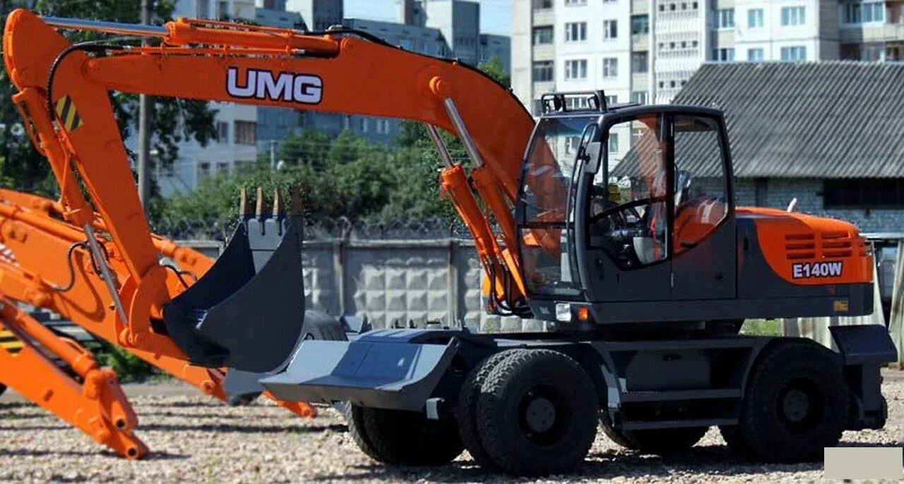 Колесные экскаваторы umg. Umg e140w. эксмаш e140w. экскаватор колесный umg e170w. экскаватор umg e140w.