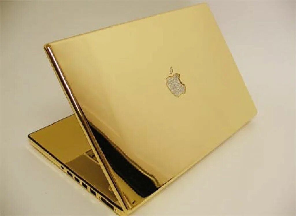 Компьютер gold. Ноутбук Аппле золотой. MACBOOK Pro 24 Karat Gold. Голд эпл эпл Голд. Макбук Эйр м1 золото.