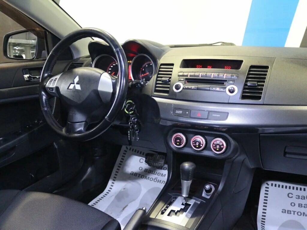 Mitsubishi lancer 10 автомат. Митсубиси лансер 2008 салон. Mitsubishi lancer x 2008. Лансер 10 вариатор турбо приборы салон. Mitsubishi lancer 10 автомат.
